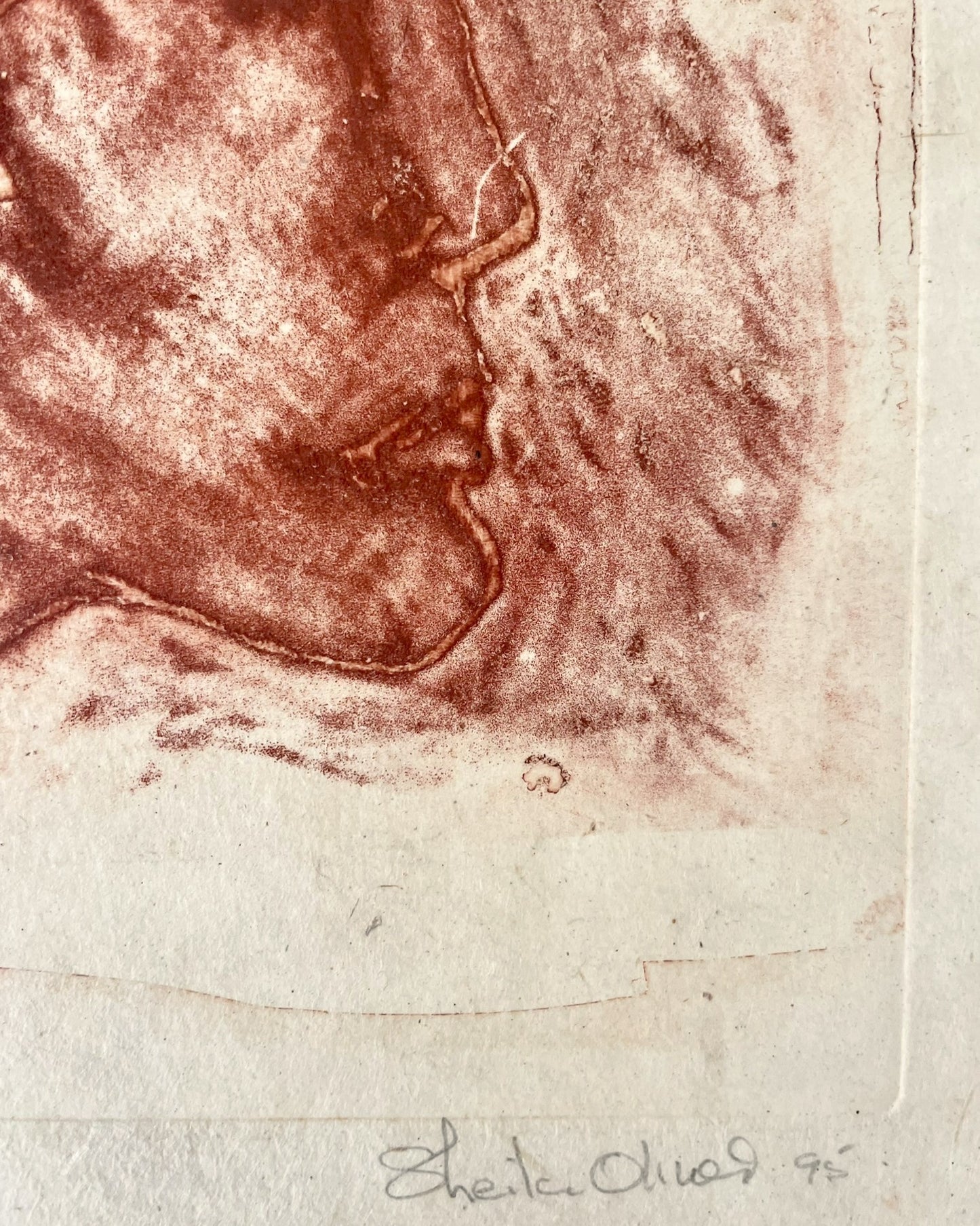 Etching in red ink of a woman’s profile by Sheila Oliner, 1995 artist proof, signed and framed