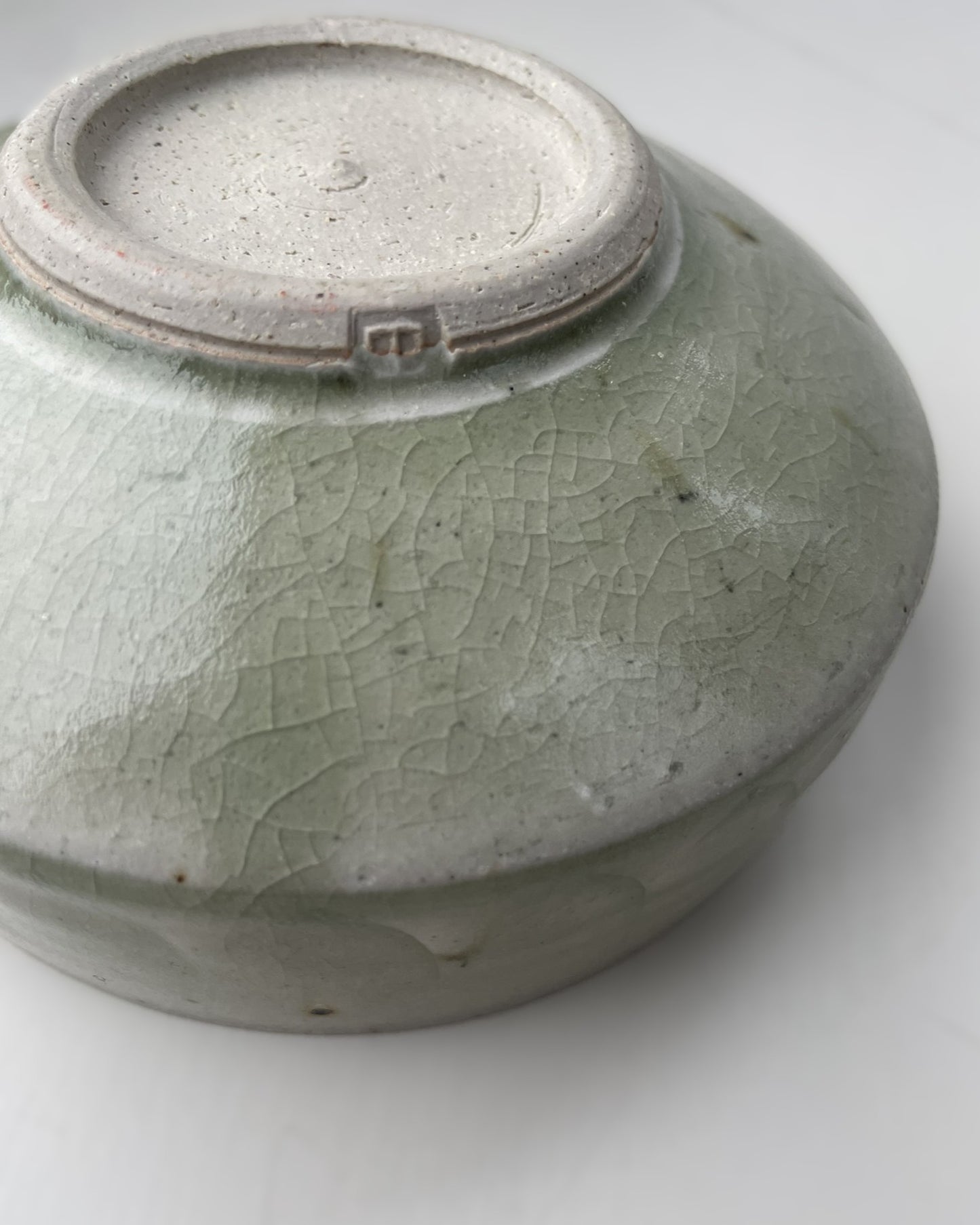 A green celadon glaze bowl by Arthur Griffiths