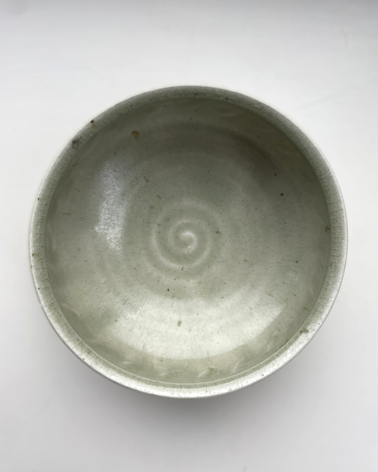 A green celadon glaze bowl by Arthur Griffiths