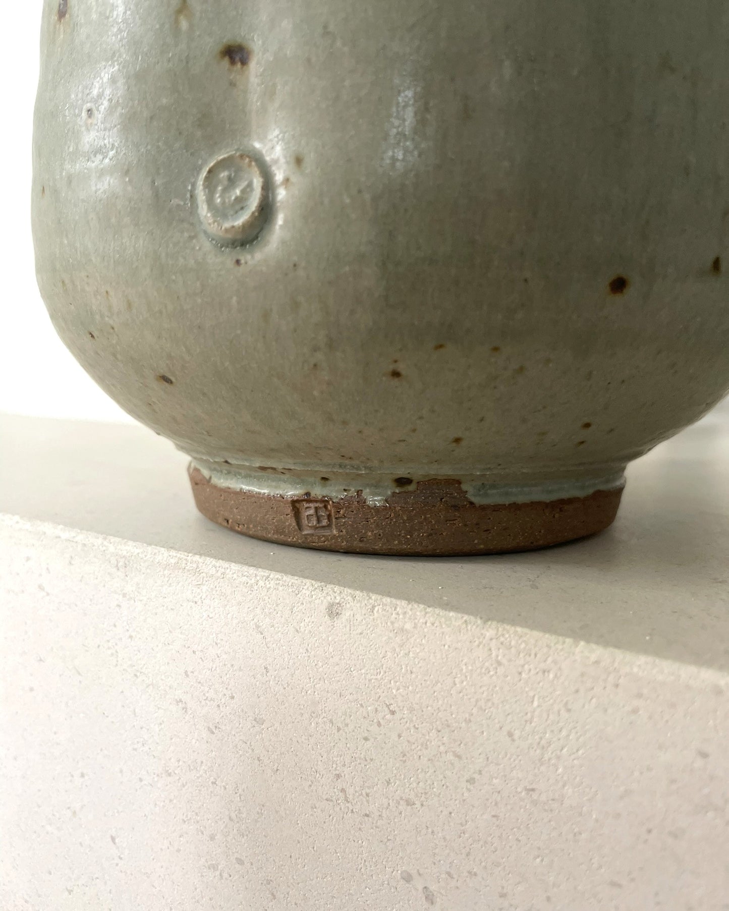 A green celadon glaze Jar by Arthur Griffiths